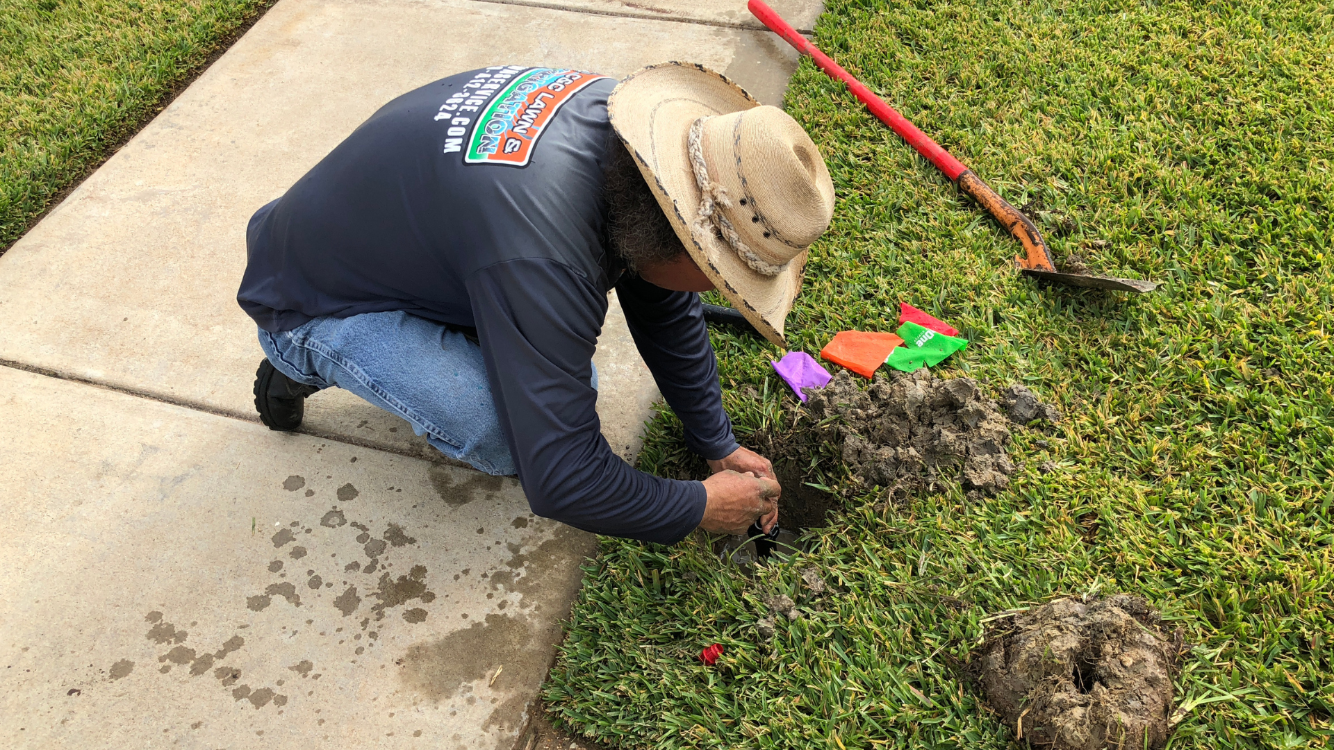 Irrigation system repair work on a Brazos Valley property, illustrating one of the hidden costs of lawn neglect